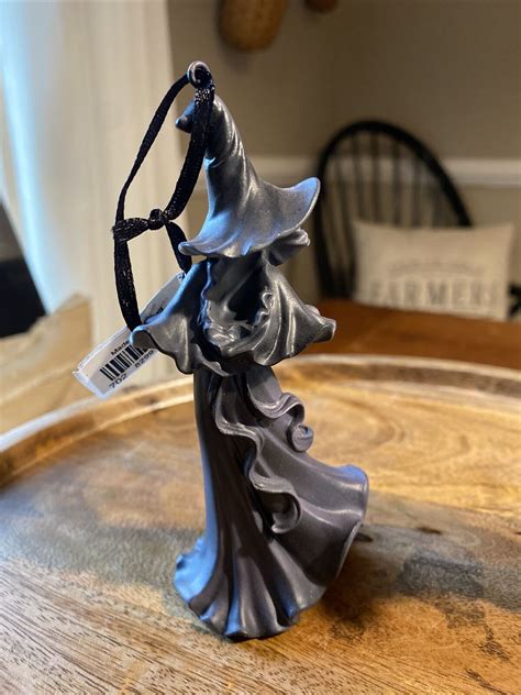 The Fascinating Stories Behind Cracker Barrel Witch Ornament Artists